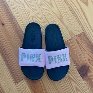 Never worn pink slides